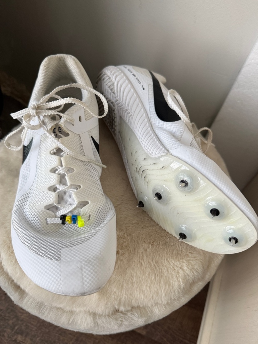 Nike White Sprint Spikes with Black Swoosh